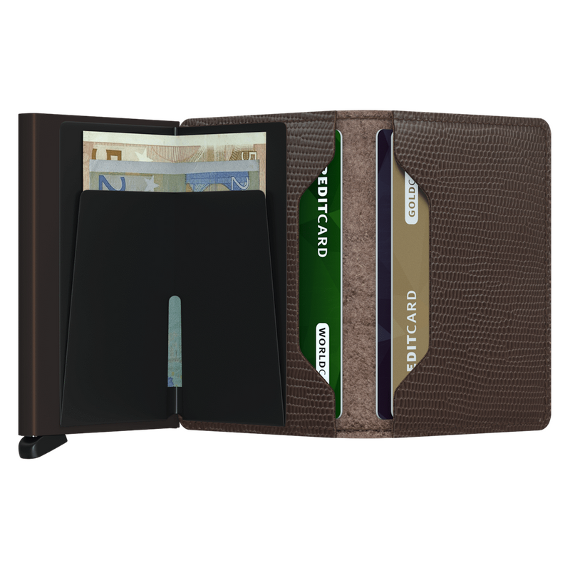 Meet the the Secrid Slimwallet Rango, an RFID protective wallet built in an aluminium case to protect your credit cards from bending, scratching or any data theft. The Slimwallet Rango has a deep duotone colour and a fine lizard embossing that makes it striking in subtle ways. 