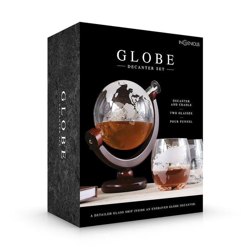 Globe decanter set with 2 matching glasses Decanter is shaped like the world and contains a glass ship Decanter and glasses feature map-style markings Includes a crescent-shaped, wooden stand