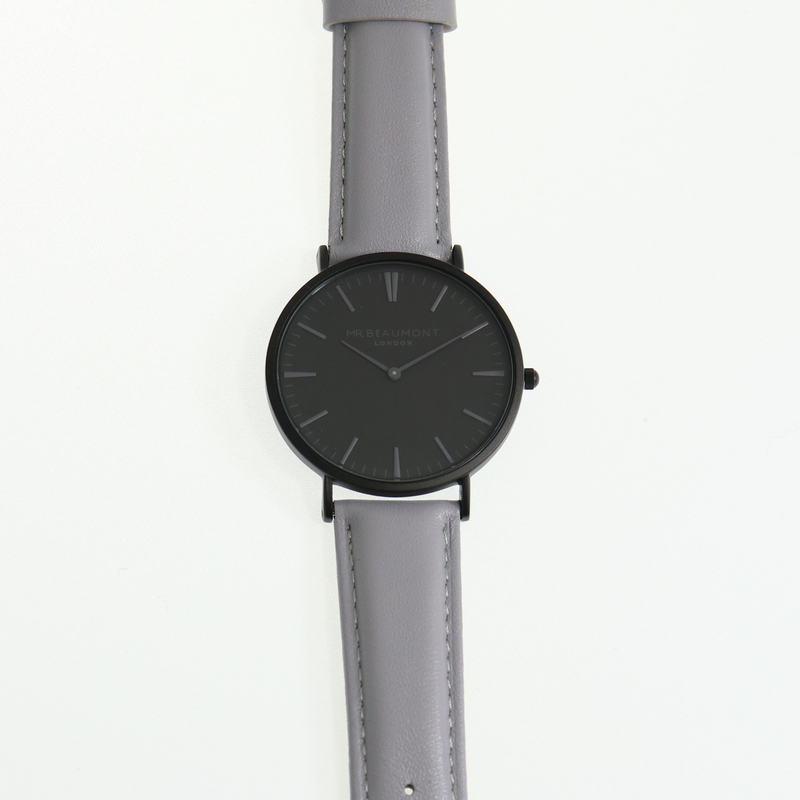 Complete your look every day with this timeless piece, Mr Beaumont Mens Watch - Matte Grey is a classic men watch that consists of a metallic black case, a striking carbonised dial - all complemented by a genuine nappa leather strap, in light grey