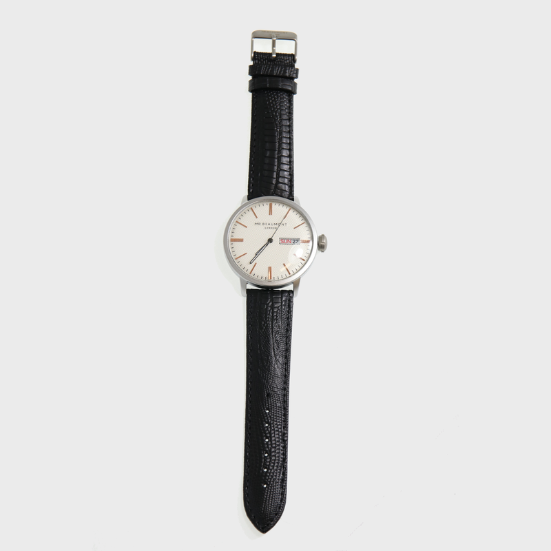 Find your style or just switch between outfits but you will always be in style with the right accessory, the Mr Beaumont Mens Watch - Silver Case MB1803.4 is a classic mens watch that consists of a metallic black case, a striking carbonised dial - all complemented by a genuine nappa stamped leather strap, in black.