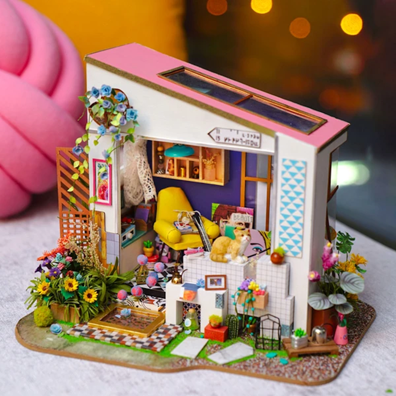 Robotime Lily's Porch is a Miniature Set 3d puzzle with a Lovely Porch- Wood mini house with a cat and small flower yard to build. 