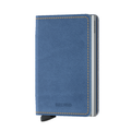 Get a modern look with a new slim wallet from Secrid, the Secrid Slimwallet Indigo is inspired by the unique colouring of denim. The soft leather is dipped repeatedly to a perfect shade of multitoned denim blue. Indigo is full-grain leather, made in Holland from European cowhide. It protects your credit cards with the built-in aluminium case and it holds banknotes in a slim design to look and feel light and compact in your pocket.